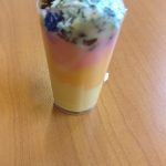 layers of earth in a dessert cup using natural colours